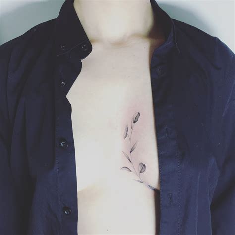 inbetween breast tattoos|Uncover 8 Stunning Meanings of Between Breasts Tattoos